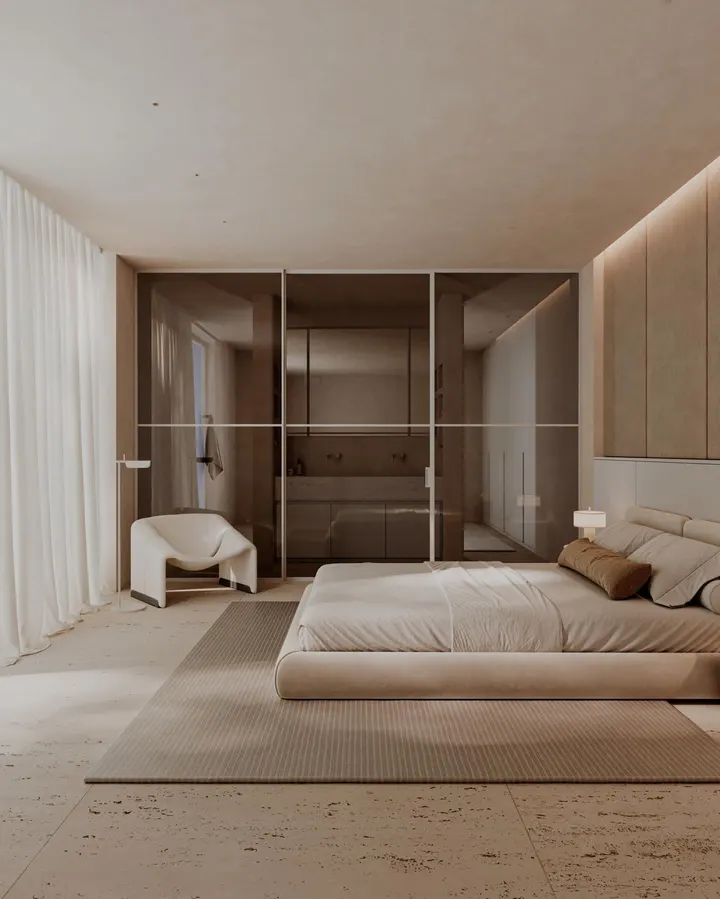 Cerramiento divisor para dormitorio con cristal ahumado, diseñado para separar espacios sin perder luz ni continuidad visual.